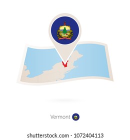 Folded paper map of Vermont U.S. State with flag pin of Vermont. Vector Illustration