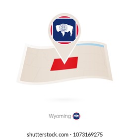 Folded paper map of Wyoming U.S. State with flag pin of Wyoming. Vector Illustration