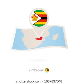 Folded paper map of Zimbabwe with flag pin of Zimbabwe. Vector Illustration