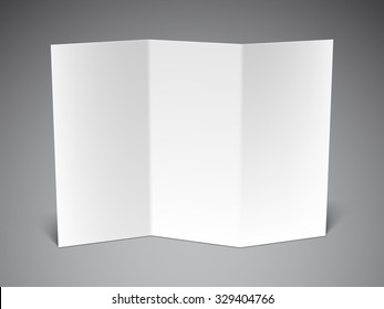 Folded white paper sheet on grey background