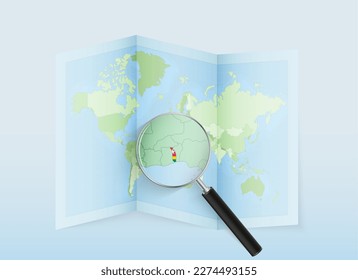 A folded world map with a magnifying lens pointing towards Togo. Map and flag of Italy in loupe. Vector illustration in blue color tone.