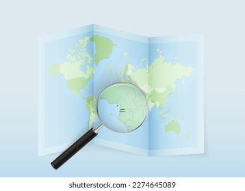 A folded world map with a magnifying lens pointing towards Equatorial Guinea. Map and flag of Italy in loupe. Vector illustration in blue color tone.