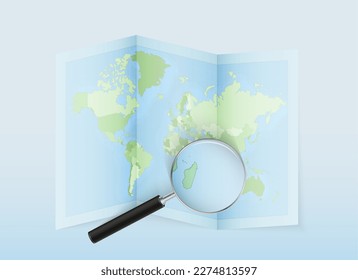 A folded world map with a magnifying lens pointing towards Mauritius. Map and flag of Italy in loupe. Vector illustration in blue color tone.