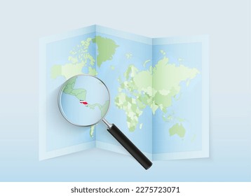 A folded world map with a magnifying lens pointing towards Costa Rica. Map and flag of Italy in loupe. Vector illustration in blue color tone.