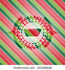 folder icon inside christmas colors style emblem.