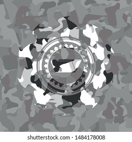 folder icon inside grey camouflaged emblem