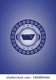 folder icon inside jean or denim emblem or badge background