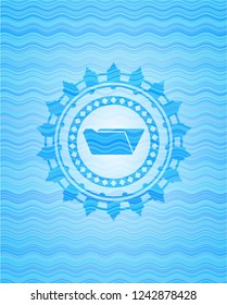 folder icon inside light blue water wave style emblem.