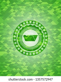 folder icon inside realistic green mosaic emblem