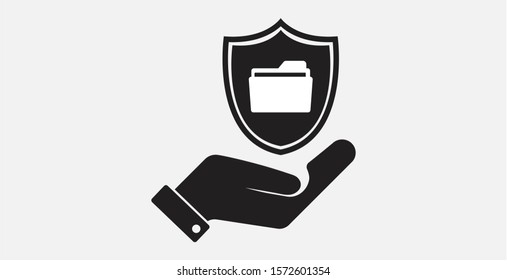 Folder with security shield sign icon in a hand. Filled vector icon illustration