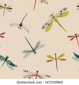 Folk art ornate insects background. Colorful seamless pattern of dragonflies with decorated wings. 