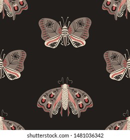 Folk art ornate insects background. Colorful seamless pattern of night moths with decorated wings. 