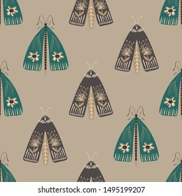 Folk art ornate insects background. Colorful seamless pattern of night moths with decorated wings. 