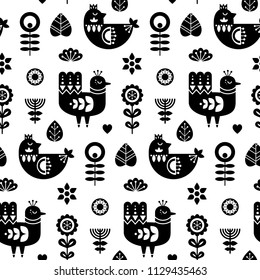 Folk art seamless pattern with birds and decorative floral elements. Black and white print template. Good for printing. Scandinavian style. Vector illustration.