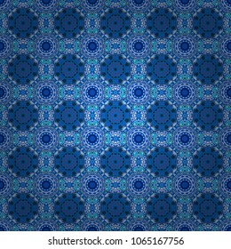 Folk ethnic floral ornamental mandala in blue, violet and gray colors. Vector abstract colorful painted kaleidoscopic graphic background. Seamless background pattern.