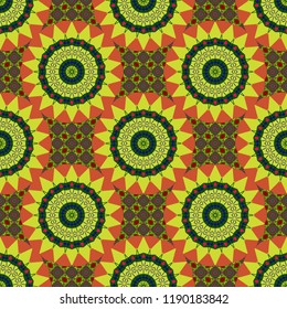 Folk ethnic floral ornamental mandala in orange, red and green colors. Vector abstract colorful painted kaleidoscopic graphic background. Seamless background pattern.