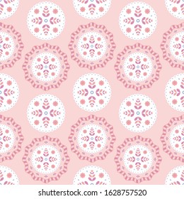 Folk floral ornament. Seamless pattern with abstract flowers on pink background.