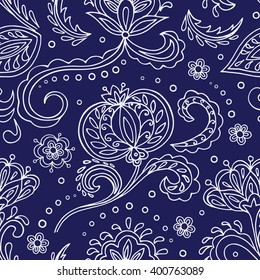 Folk floral seamless pattern. Decorative flowers. White and blue background. Monochrome vector illustration.