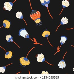 Folk floral seamless pattern in trendy modern style. Colorful wildflowers isolated on a dark background. Perfect for textile, background, paper.
