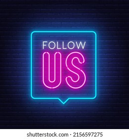 Follow us neon sign in the speech bubble on brick wall background.