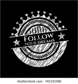 Follow your dreams chalkboard emblem on black board