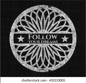Follow your dreams on chalkboard