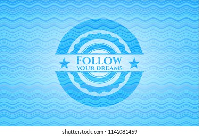 Follow your dreams water wave representation emblem.