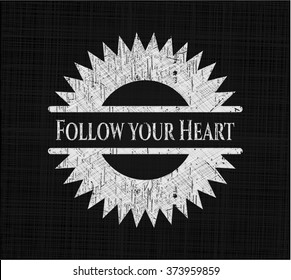 Follow your Heart chalkboard emblem on black board