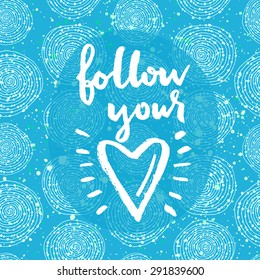 Follow your heart. Hand lettering quote on a creative vector background