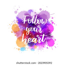 Follow your heart - inspirational handwritten modern calligraphy lettering text on abstract watercolor paint splash background. Inspirational text.