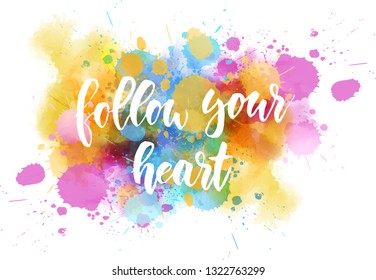 Follow your heart - motivational message, Handwritten modern calligraphy text on abstract watercolor paint splash background.