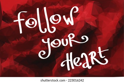 follow your heart phrase handwritten on a red background