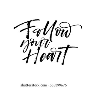 Follow your heart postcard. Phrase for Valentine's day. Ink illustration. Modern brush calligraphy. Isolated on white background. 