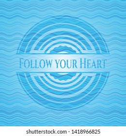 Follow your Heart sky blue water emblem background. Vector Illustration. Detailed.
