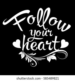 Follow your heart. Vintage calligraphic  lettering. Luxury  text with floral ornaments and hearts. White  isolated letters on the black  background.