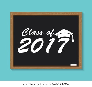 Font 2017 class of with graduation hat  write on school blackboard. Education graduation hat with font 2017. Class of card