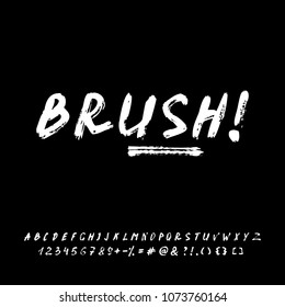 FONT BRUSH. Hand crafted typeface design. Original handmade alphabet. Isolated doodle vector letters. Hand drawn street font on a black background.   A set of letters, numbers and symbols marker. 