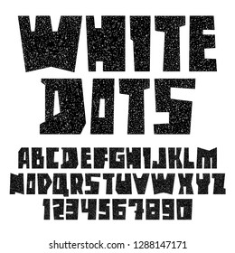 Font cut from sheets paper. Trendy alphabet, black vector letters with white dots, uppercase