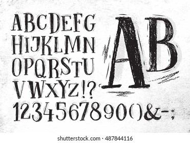 Font pencil vintage alphabet drawing in black color on dirty paper background.