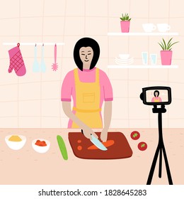 Food blogger. Asian Chinese Japanese chef cooking in the kitchen while recording video using her camera for her online video channel. Cook healthy food at home. homemade meals. culinary video master. 