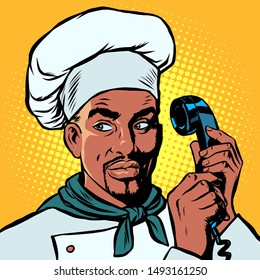 Food delivery. African Chef takes orders by phone. Pop art retro vector illustration drawing