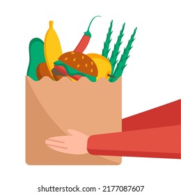 Food delivery. Courier brought a package of food. Hand holds out bag of food.