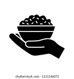 Food donation glyph icon. Silhouette symbol. Open hand with rice bowl. Chinese fried rice for free. Negative space. Vector isolated illustration