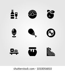 Food And Drinks vector icon set. orange, wine, chicken leg and sandwich