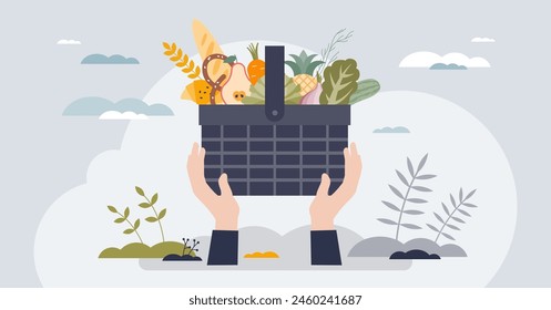 Food drive as grocery donation for poor community tiny person hands concept. Full basket with healthy products for eating vector illustration. Volunteer giving ingredients for soup kitchen campaign.