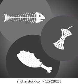 Food leavings (fish, apple, chicken) in gray colors