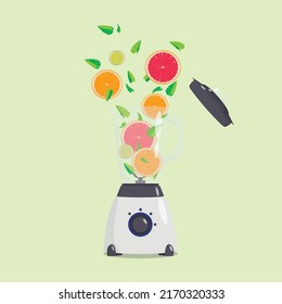 Food processor, mixer, blender with citruses. Variety of ingredients: grapefruit, orange, lime, mint. Healthy eating. Fitness and body care concept. Smoothie preparation