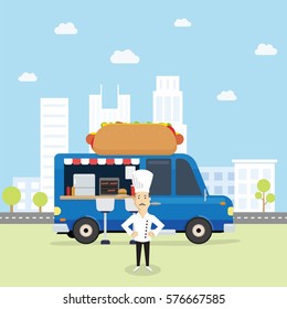 Food Truck selling hamburger and hotdog with chef in front of it