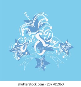 Fool's day text over blur background with two jokers  over blue color  background