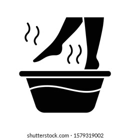 Foot Bath Glyph Icon. Leg In Hot Water. Spa Treatment. Common Cold Treatment. Healthcare And Skincare. Wellness. Sickness Help. Silhouette Symbol. Negative Space. Vector Isolated Illustration